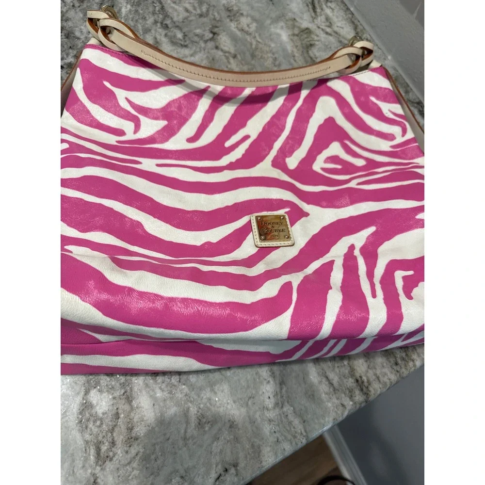 Dooney & Bourke pink white zebra print hobo handbag  leather straps‎ gold logo
